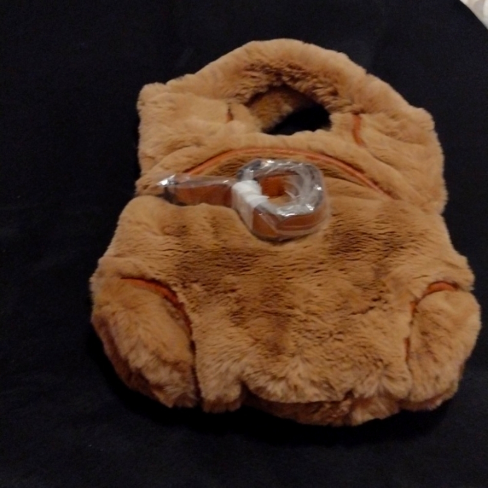 Foley andCorinne backpack, purse.